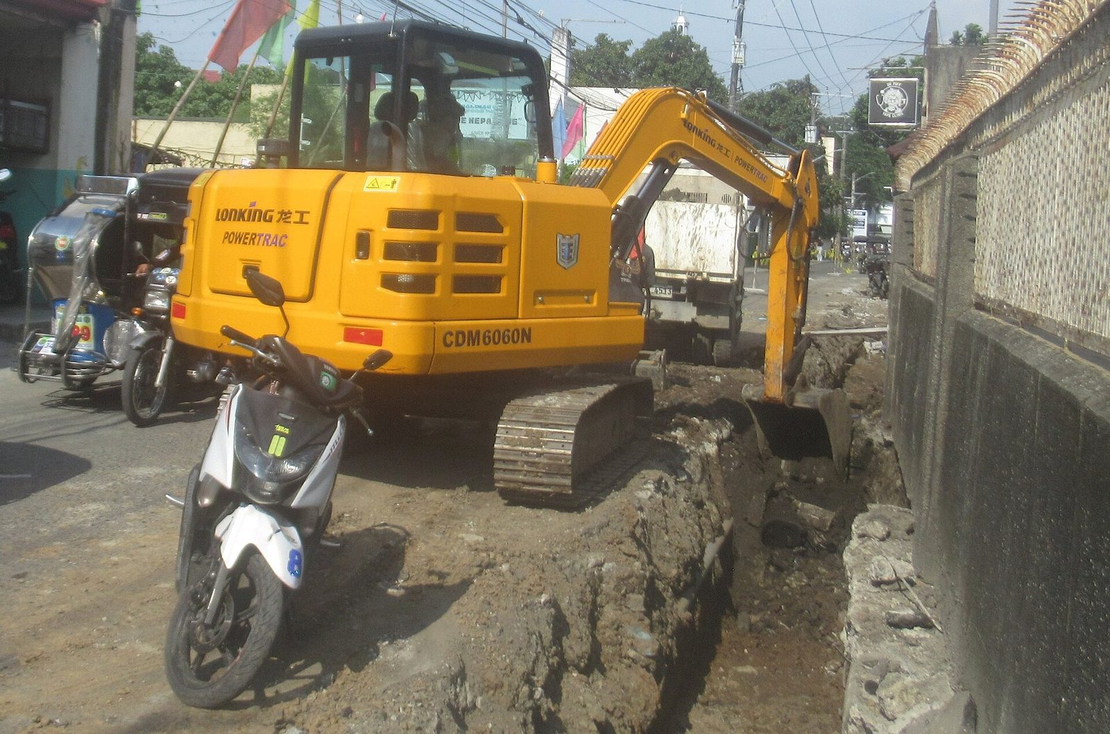 Excavator digging at a construction site