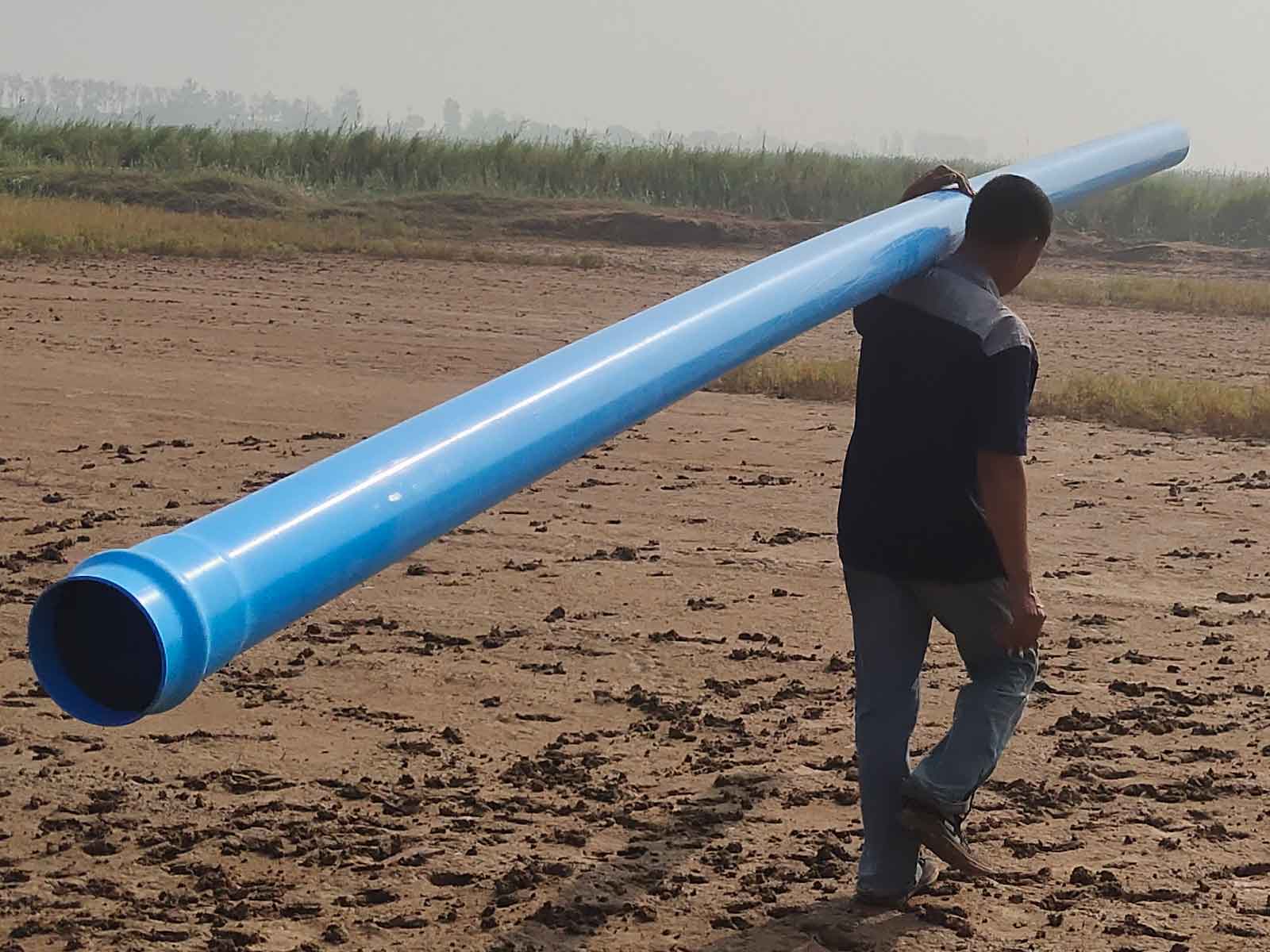 Stack of white PVC pipes